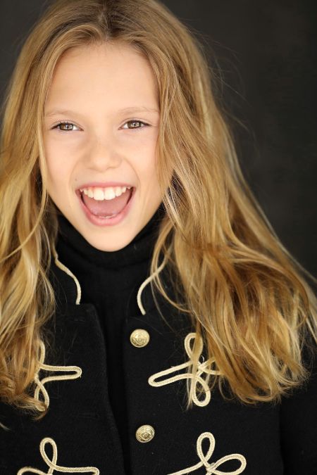 Bluesy LaRue Burke is thirteen years old as of 2021.